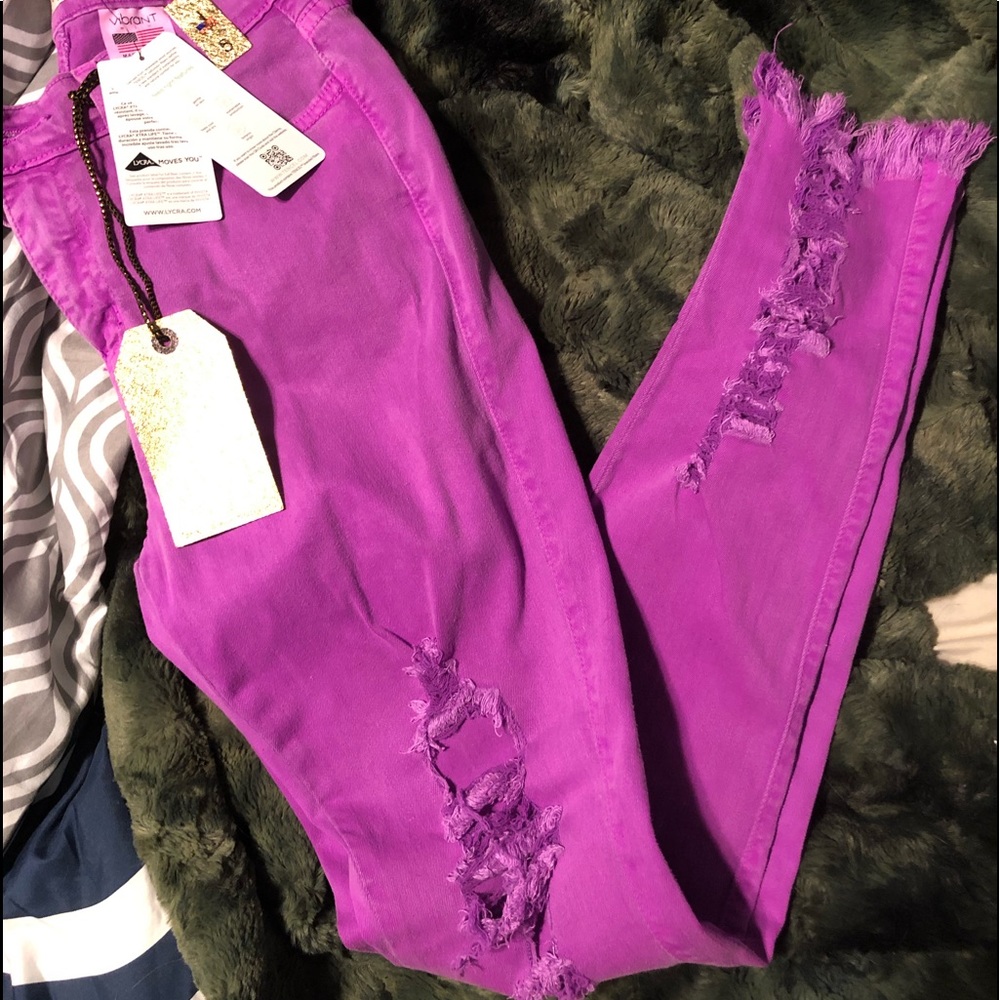Vibrant purple distressed jeans